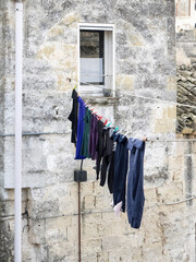 Poster - Clothes hanging on the line in the old town of Matera.