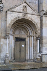 Wall Mural - Fidenza, Italy: Cathedral of San Donnino, detail of the entrance door