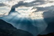 © robertharding - Sun rays through clouds over Matterhorn during a backlit sunset, Zermatt, Valais canton