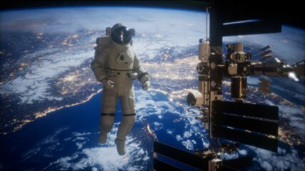 international space station and astronaut in outer space over the planet earth. elements of this ima