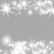 © timchig - White glowing light explodes on a transparent background. Sparkling magical dust particles. Bright Star. Transparent shining sun, bright flash. Vector sparkles. To center a bright flash.