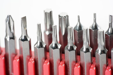 Poster - Closeup of different drill bits isolated in the white background