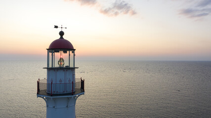 Sticker - Lighthouse on the Kihnu island in Estonia during a beautiful sunset