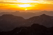 Golden Sunrise Over Mountain Range In The Swiss Alps Grisons Bernina