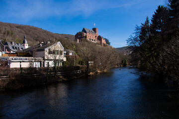 The view of Hengebach Castle and the Rur on a sunny winter day