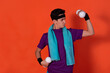 © Denis - Funny young man and retro style. Sports and recreation. Bright colors. Orange background.