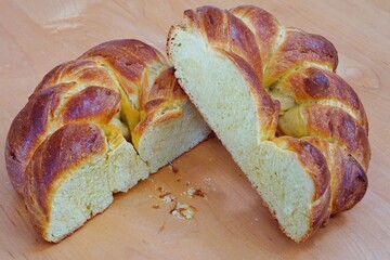 Wall Mural - A braided challah brioche bread shaped as a heart cut in half