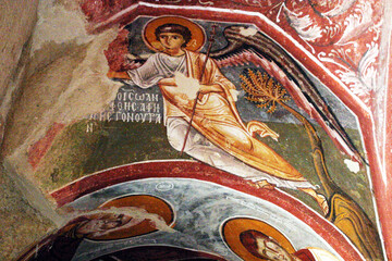  Christian frescoes at cave in Goreme District, Aksaray, Cappadocia, Turkey.