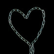 metal chain in a shape of love heart on black background. isolated