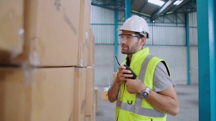 Wall Mural - Professional industry worker close up portrait in the factory or warehouse . Production line operator or engineering looking at camera .