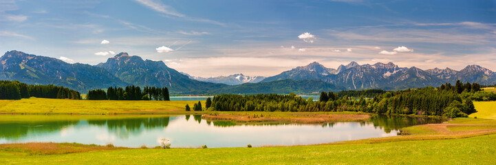 Poster - panoramic landscape with meadow and lake in Bavaria, Germany, at springtime