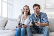 © a_medvedkov - Couple plays video game at home