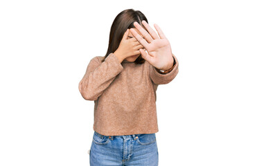 Sticker - Young beautiful woman wearing casual clothes covering eyes with hands and doing stop gesture with sad and fear expression. embarrassed and negative concept.