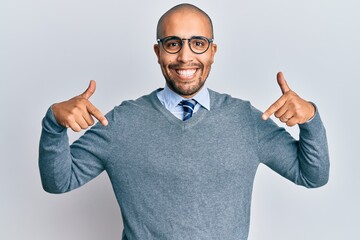 Poster - Hispanic adult man wearing glasses and business style looking confident with smile on face, pointing oneself with fingers proud and happy.