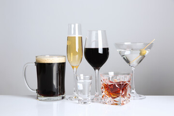 Wall Mural - Many different alcoholic drinks on white background