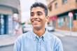 © Krakenimages.com - Young latin man smiling happy walking at the city.