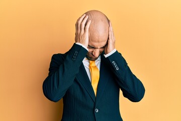 Sticker - Young hispanic man wearing business suit and tie suffering from headache desperate and stressed because pain and migraine. hands on head.