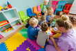 © oksix - Educational group activity at the kindergarten or daycare