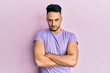 © Krakenimages.com - Young arab man wearing casual clothes skeptic and nervous, disapproving expression on face with crossed arms. negative person.