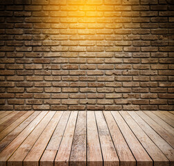  Old wood table with abstract old brick wall with light background for product display