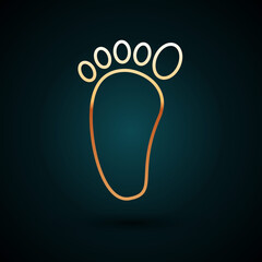 Poster - Gold line Foot massage icon isolated on dark blue background. Vector.