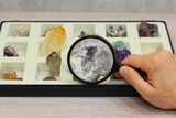 Fototapeta Na ścianę - viewing a collection of minerals through a lens