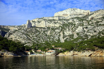 Village in the small bay and the rocky cliffs, Parc National des Calanques, Marseille, France