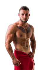 Portrait of naked handsome young man with languishing look covering waist with a towel, isolated on white