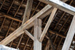 Wood timber framing in a very old barn. A view of wonderful, old construction techniques in an Illinois barn from many years ago. 