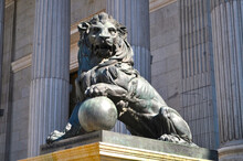Statue Of Lion At Palace Of Parliament (Congress Of Deputies) In Madrid, Spain