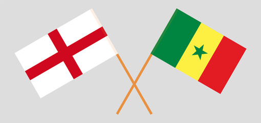 Crossed flags of England and Senegal