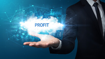 Hand of Businessman holding PROFIT inscription, successful business concept