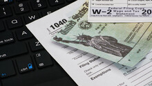 US IRS Internal Revenue Service Income Tax Filing Form 1040 With Supporting Documents.