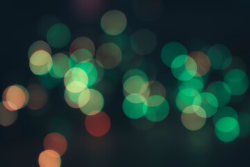 muted green bokeh effect on black background