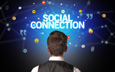rear view of a businessman with social connection inscription, social networking concept