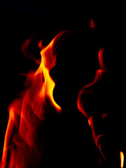 Fire flame burn glowing on black background, beautiful abstract fire blazing to orane and red flame show high and power energy, photo beauty for graphic creative design fire wallpaper and pattern