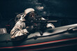 © andy_gin - Military man in full combat ammunition is following a poacher in a boat with a flasher. Concept of robbery, piracy, poaching, human and drug trafficking.