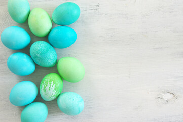 Wall Mural - Light blue and green Easter eggs