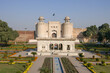 View with garden and marble pavilion of white Alamgiri gate built by mughal emperor Aurangzeb, Lahore fort, UNESCO World Heritage site, Punjab, Pakistan