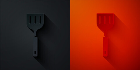 Paper cut Spatula icon isolated on black and red background. Kitchen spatula icon. BBQ spatula sign. Barbecue and grill tool. Paper art style. Vector.