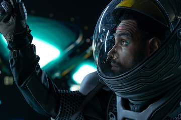 Wall Mural - portrait of african american black male astronaut inside spaceship cockpit. sci-fi space exploration