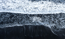 Scene Of Foam Sea Waves Rushing Ito The Black Sandy Shore
