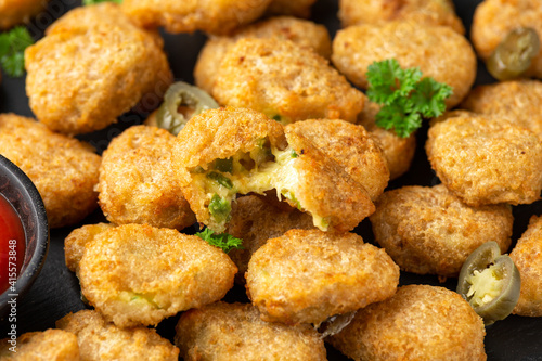 Obraz Dibond Crispy Jalapeno Popper with creamy cheese battered party food bites