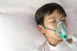 © TinPong - Young asian boy with face oygen mask