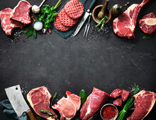 Assortment Of Raw Cuts Of Meat, Dry Aged Beef Steaks And Hamburger Patties
