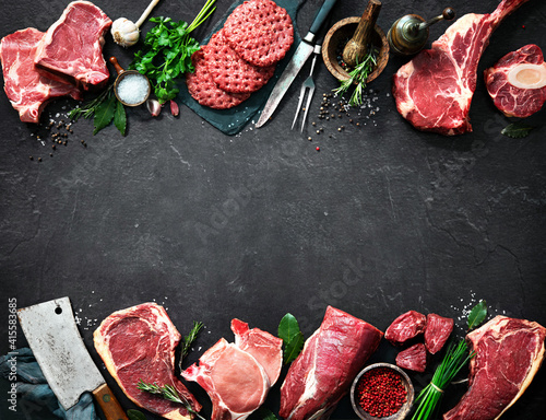 Variety of raw cuts of meat, dry aged beef steaks and hamburger patties © Alexander Raths