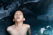 © TinPong - Young boy in hot water