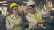 © Ha-nu-man - Professional mechanical engineer and operation team wearing uniform safety working metal lathe industrial manufacturing factory, Heavy industry lathe worker man and woman