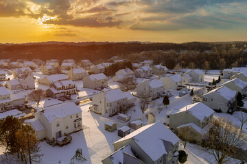 Wall Mural - America small town houses and streets a after the snowy day peaceful landscape amazing winter snow scenery in sunset