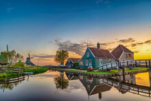 Amsterdam Netherlands, Sunrise Landscape Of Dutch Windmill And Traditional House At Zaanse Schans Village